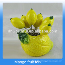 Atractivo diseño de fruta de cerámica tenedor conjunto para los niños en forma de mango